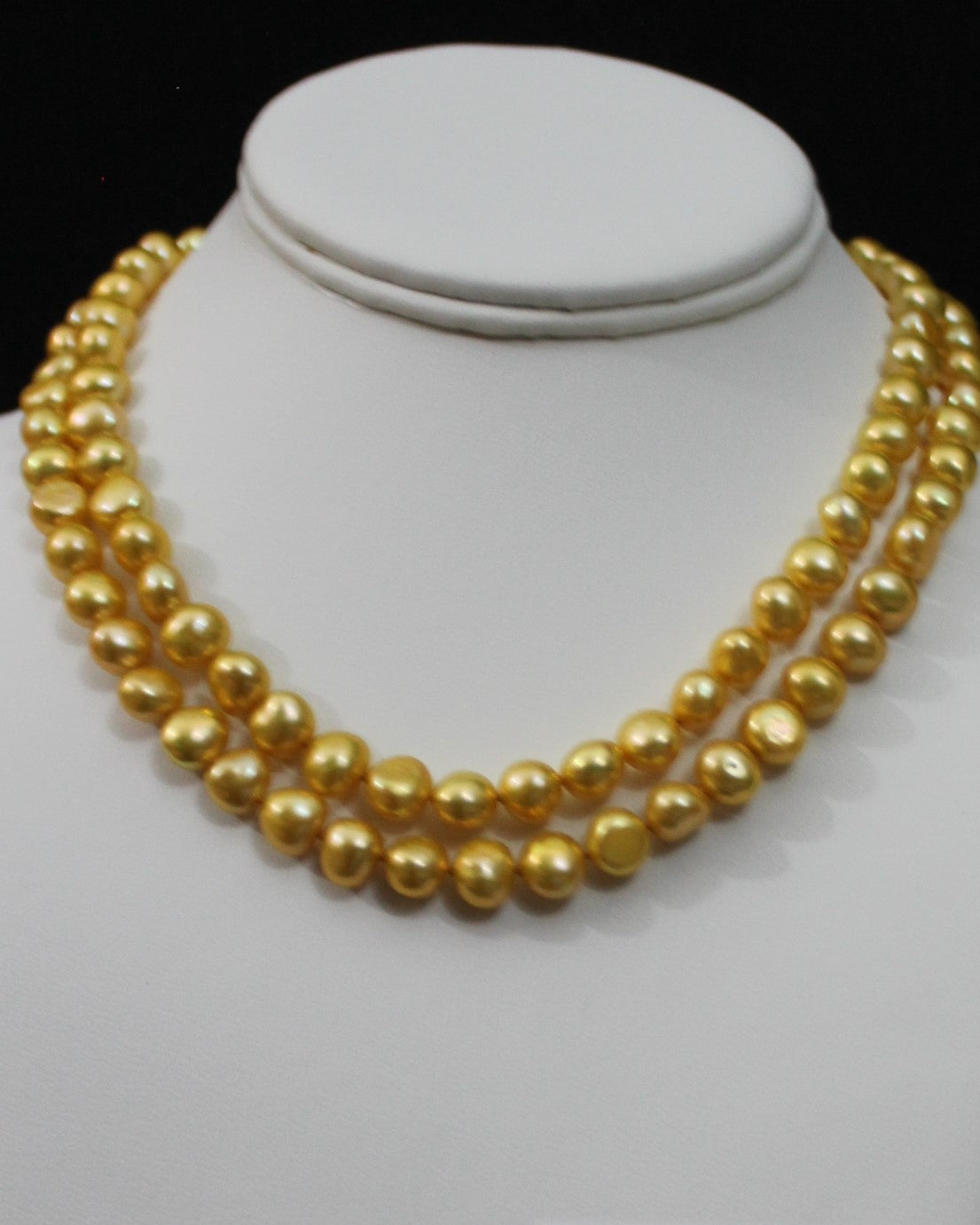 Gold color cultured button pearl necklace 2 strands with 14 karat gold clasp. (Free shipping and taxes).