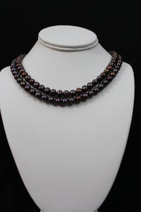 Multi color brown cultured semi round pearl necklace double strand with 14 karat gold clasp.