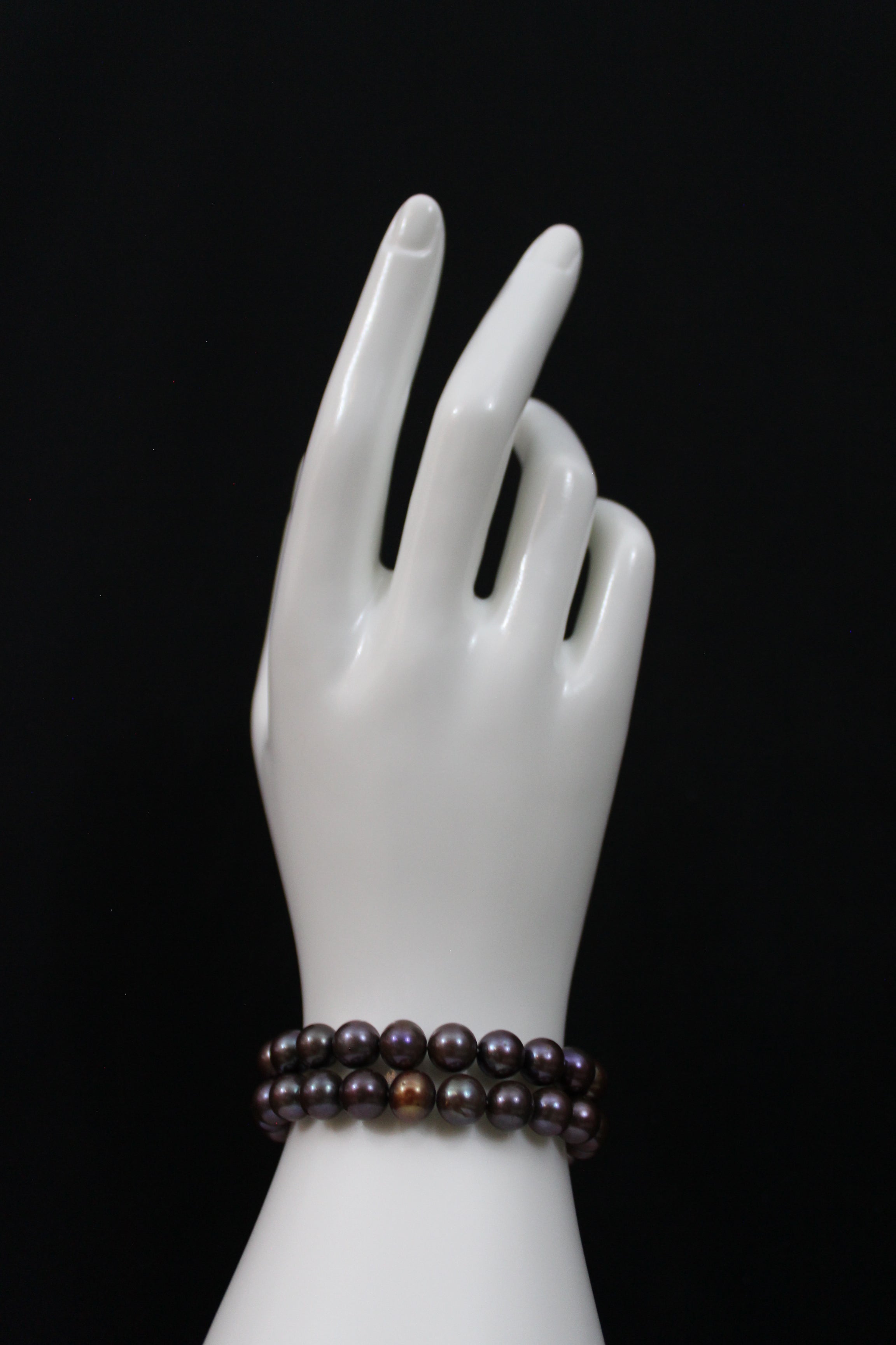 Multi color brown cultured semi round pearl bracelet double strand with 14 karat gold clasp.  (shipping and taxes free).