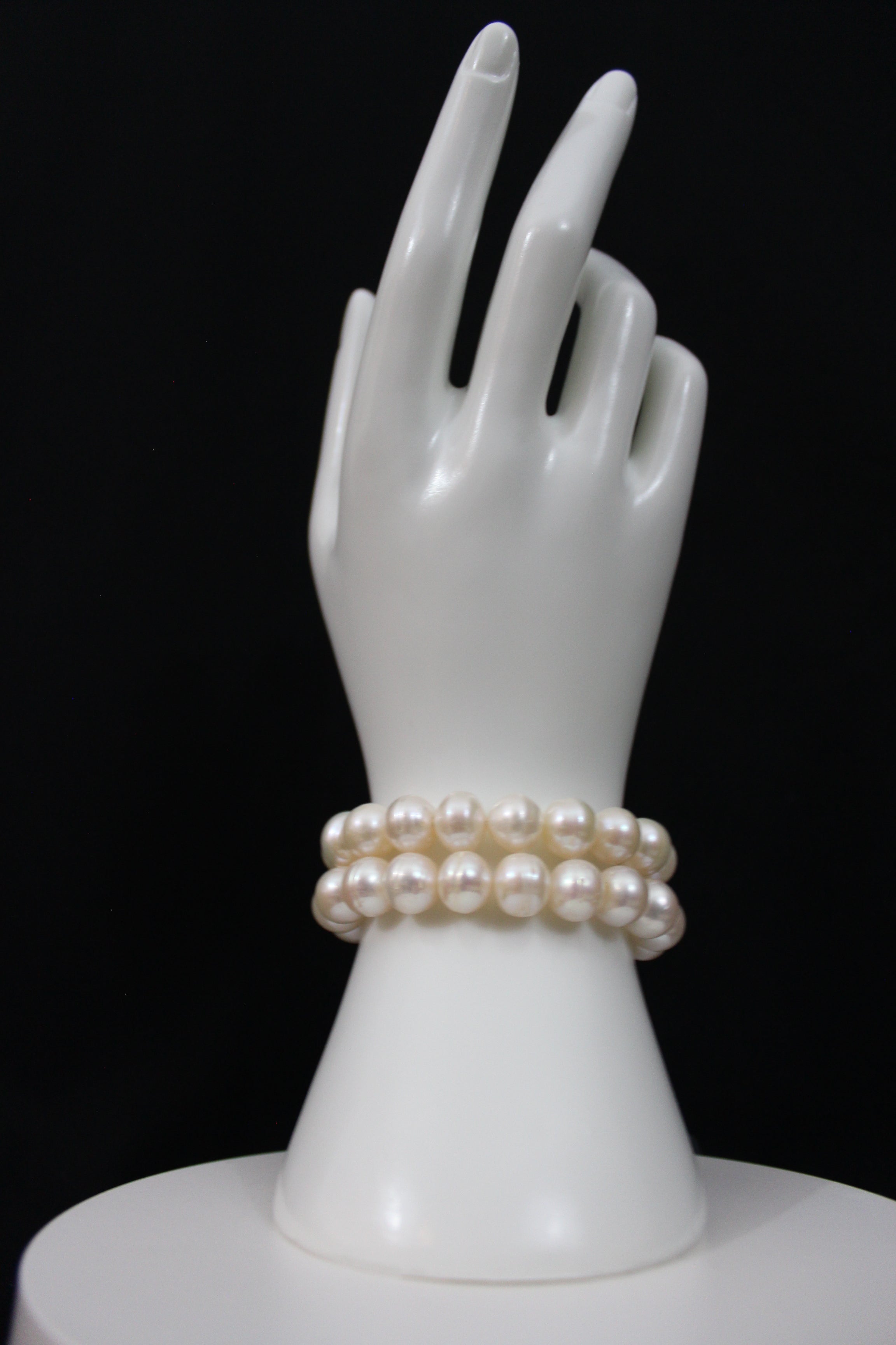 White color cultured circled baroque pearl bracelet double stranded with 14 Karat gold clasp.  (Free shipping and taxes).