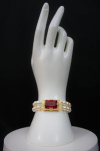 Ruby 18 Karat gold Bracelet with diamonds and cultured Japanese pearl band.   (Free shipping and taxes).