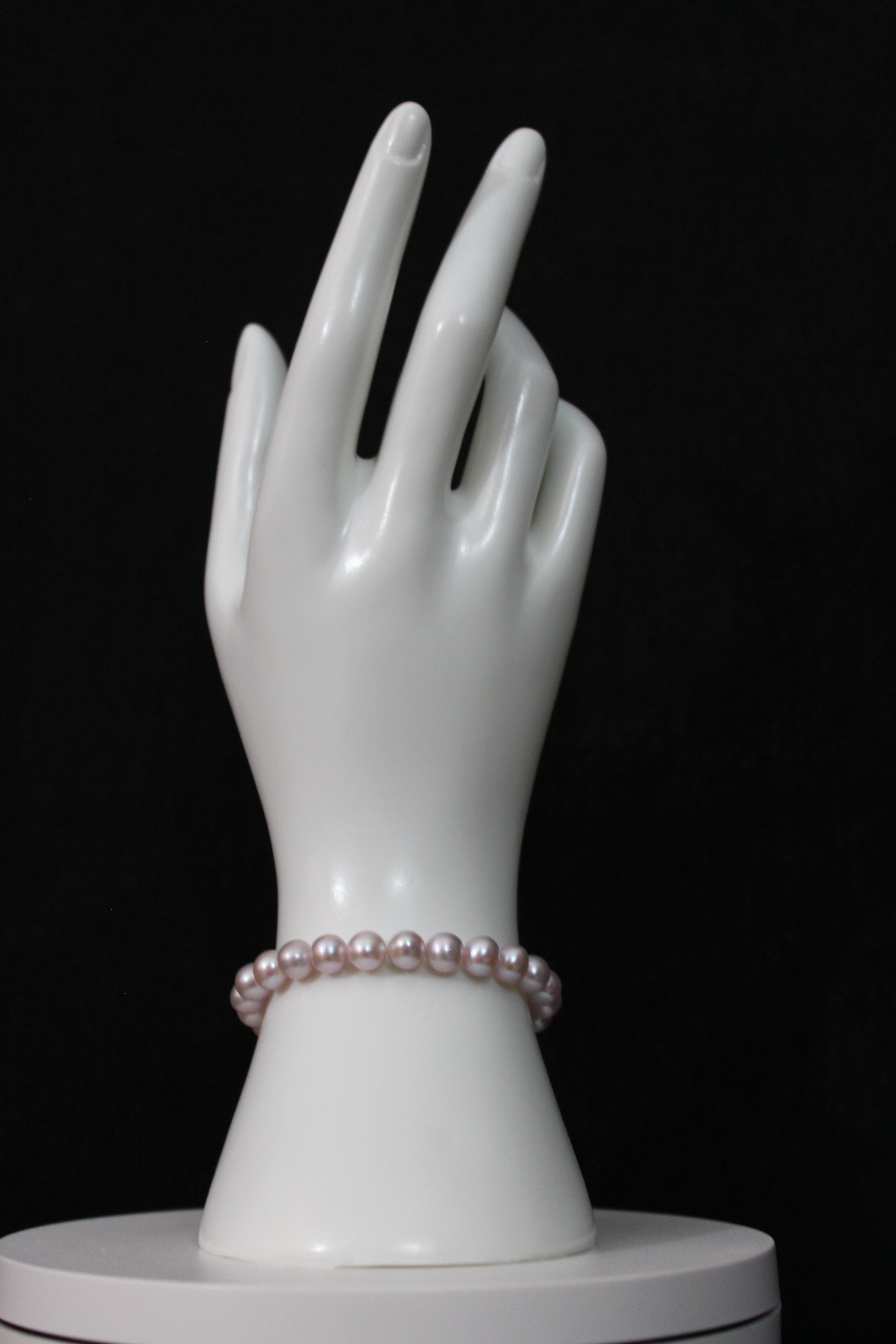 Pink rose cultured semi round pearl bracelet single strand with 14 karat gold clasp  (Free shipping and taxes).