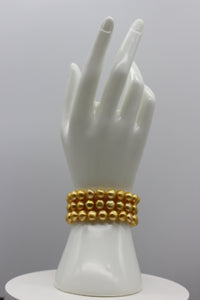 Gold color cultured button pearl bracelet 3 strands with 14 karat gold clasp  (Free shipping and taxes).