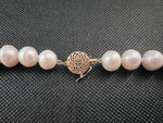 Load image into Gallery viewer, White color cultured  circled baroque pearl bracelet single strand with 14 karat gold lock.  (Free shipping and taxes).
