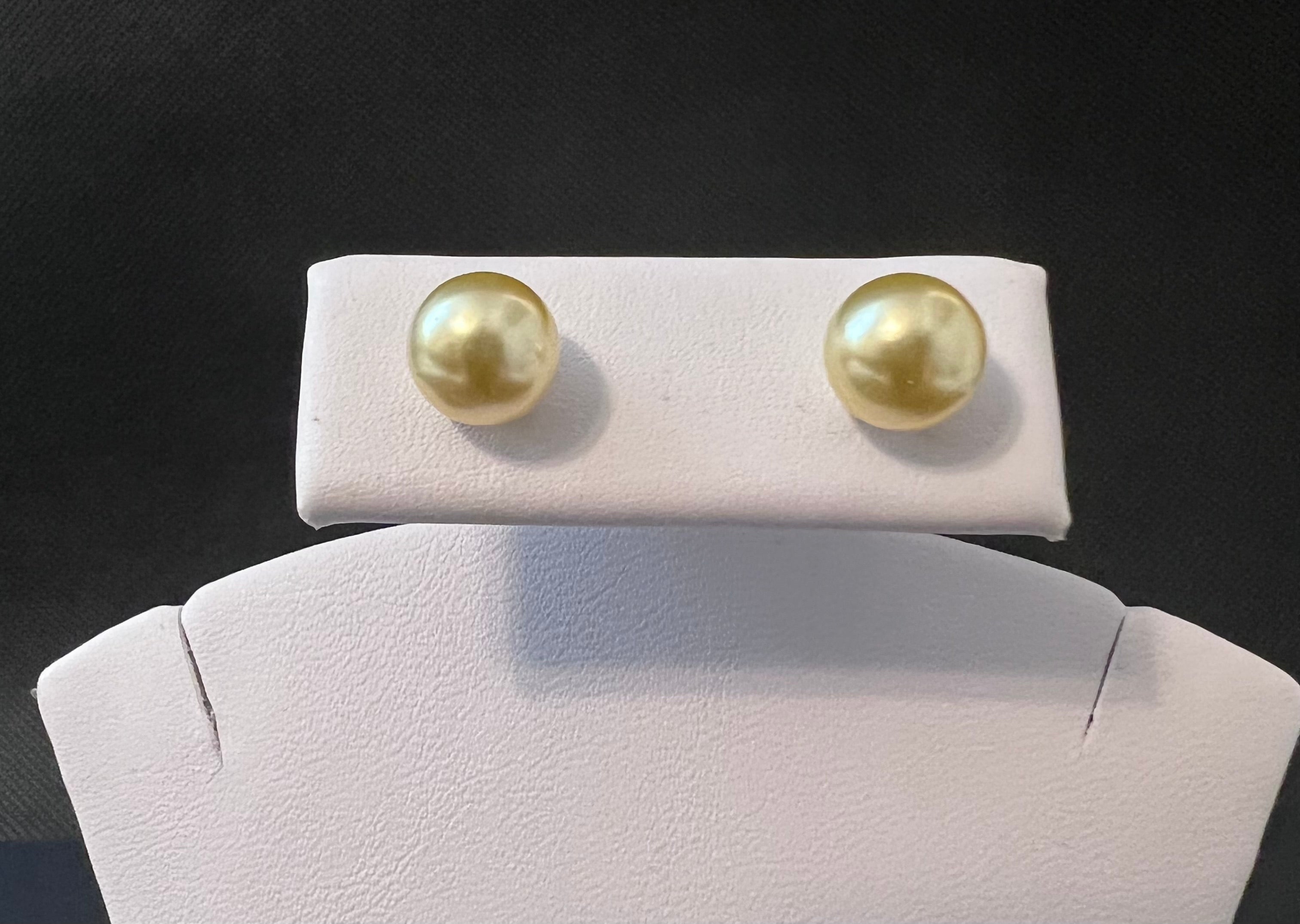 Gold color cultured button pearl earring set with 14 karat gold studs.  (Free shipping and taxes).