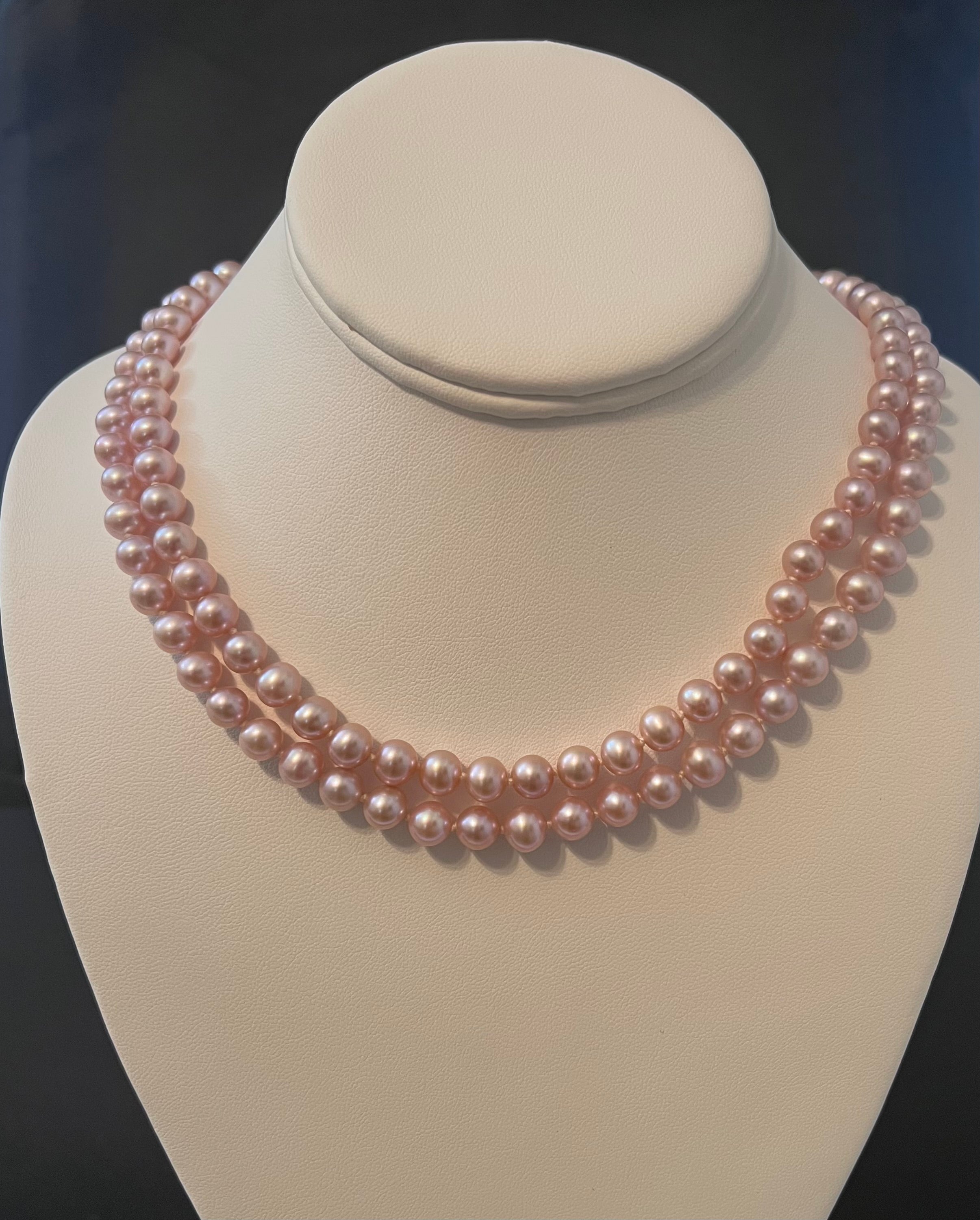 Pink rose semi round cultured pearl necklace with 2 strands and 14 karat gold clasp.  (Free shipping and taxes).