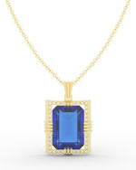 Load image into Gallery viewer, Sapphire created center stone 18 Karat gold Pendant with gold chain and garnished with 32 round clear synthetic diamonds.     (Free shipping and taxes).
